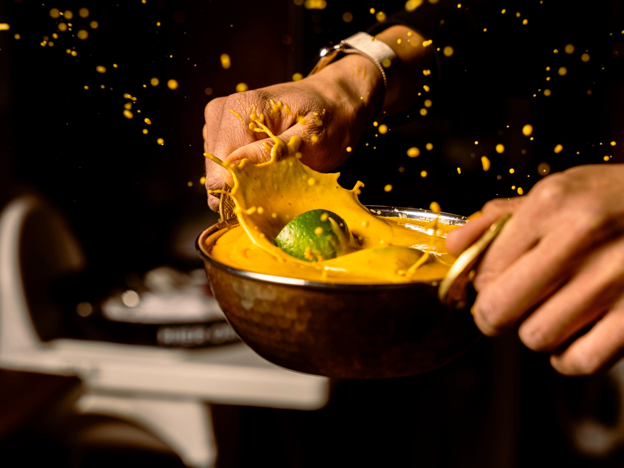 Indian curry tossed in a copper pan at GOA Indian restaurant Hamburg